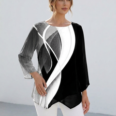 Women's geometric print tunic top, three-quarter view showing relaxed fit and asymmetric hem