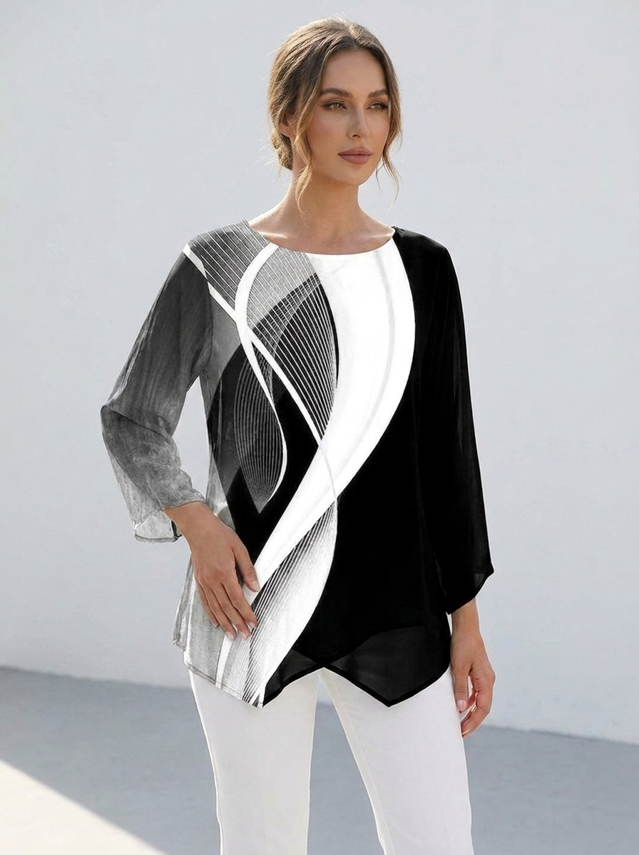 Women's geometric print tunic top, three-quarter view showing relaxed fit and asymmetric hem