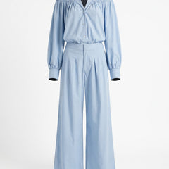 Mabel Women's Off-Shoulder Long-Sleeve Woven Jumpsuit in light blue, studio product shot