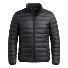 Women's Quilted Stand-Collar Puffer Jacket in black, ghost mannequin studio shot