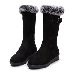 Women's fur-trimmed buckle knee-high boots in black suede