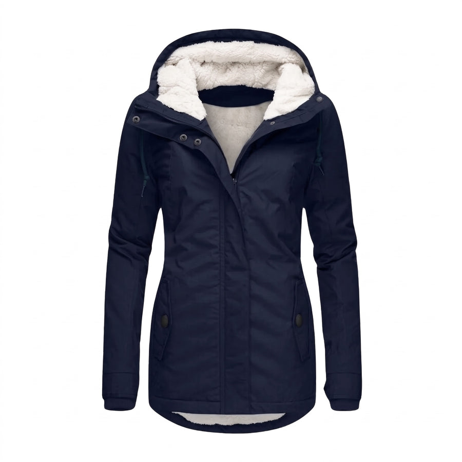 Women's hooded sherpa-lined quilted jacket in navy, ghost mannequin studio shot
