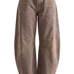 Women's low-rise baggy barrel jeans in washed brown denim, studio product shot